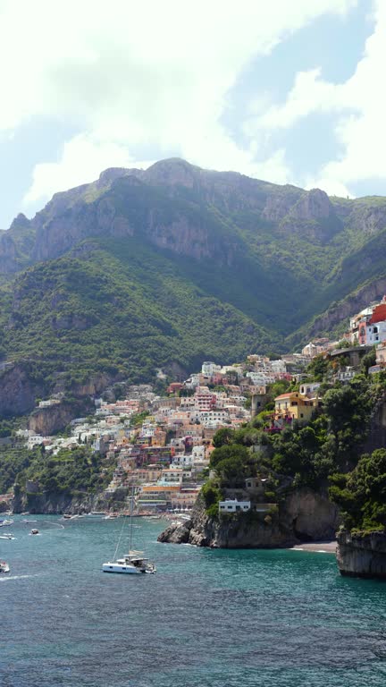 Vertical shot of Positano on a sunny day, with wonderful colors