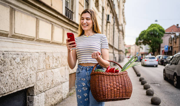 istock Woman going home from the public market 2178738060