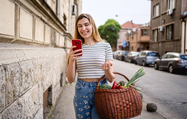 istock Woman going home from the public market 2178738113
