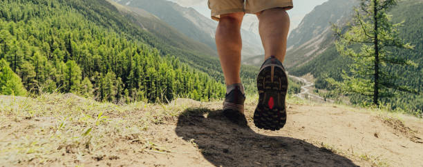 istock Mens footstep in the mountains 2178739778