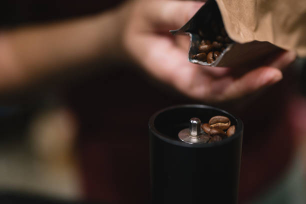 istock In vibrant cafes, the barista skillfully operated the machine, grinding fresh beans to create a perfectly grated espresso, crafting a hot drink that delighted every customer. 2178743210