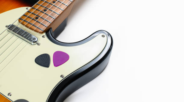 Close-up of picks on electric guitar. Empty space. Selective focus. Music lesson concept