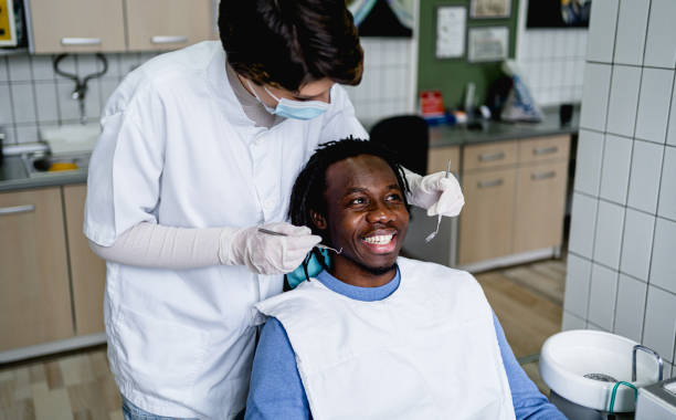 istock Man is getting treatment in a dentist's office 2178751876