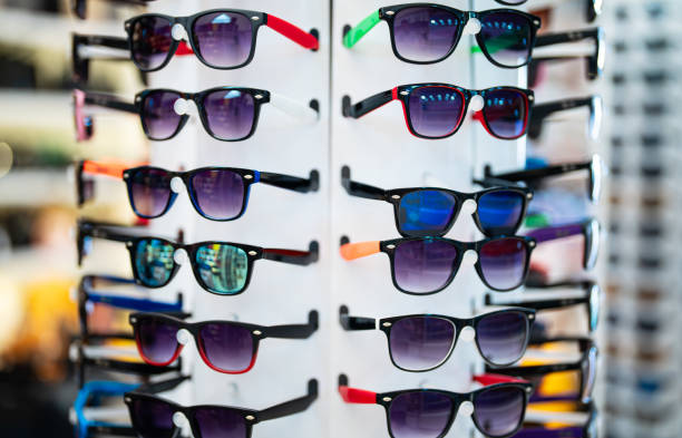 istock Large selection of multicolored sunglasses. 2178752074
