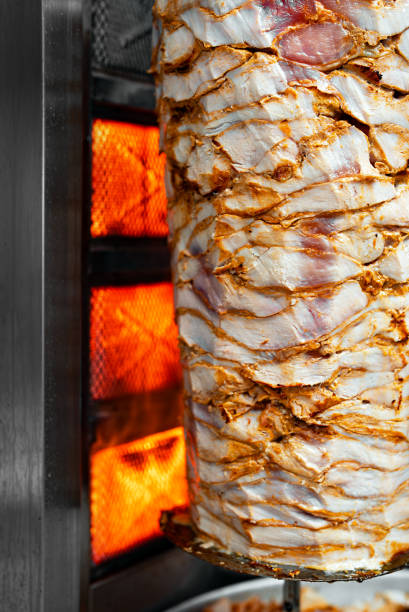 istock Juicy meat is fried on a shawarma spit. 2178752140