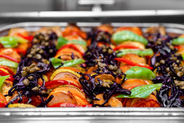 Multicolored baked vegetables. Ratatouille french provencal dish.