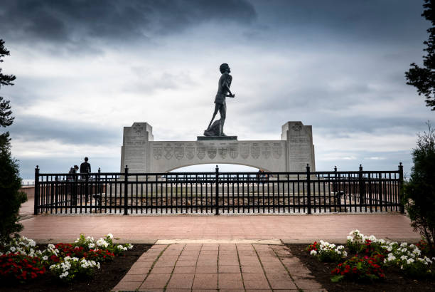 Thunder Bay, Ontario, Canada - August 23, 2024:  Statue of Terry Fox, an amputee and activist who ran across Canada to raise funds for cancer research