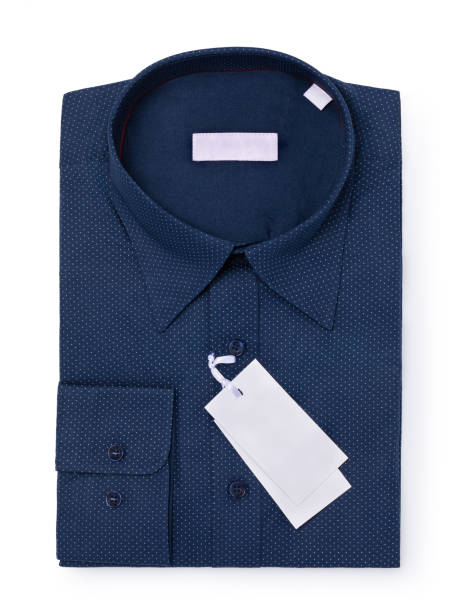istock Dark blue long sleeve folded dress shirt with a small white dot pattern on the fabric, isolated on a white background, top view 2178755796