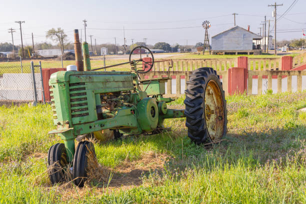 Yoakum, Texas, United States. An old green tractor in rural Texas.