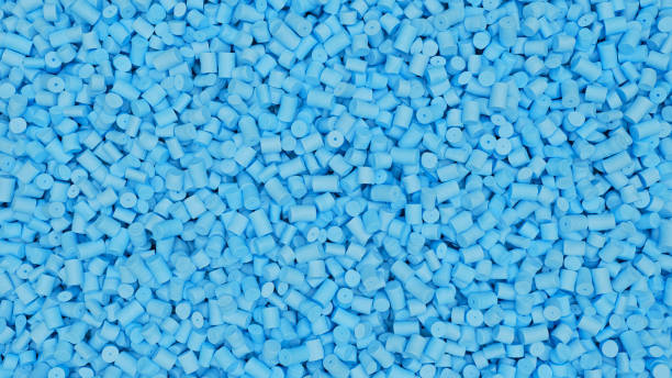 istock Closeup top view of light blue plastic polypropylene granules, masterbatch polymer grain. HDPE or PVC resin pellets. 3d render illustration 2178767603