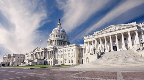 istock US Capitol in Washington DC with blue sky background 2178768386