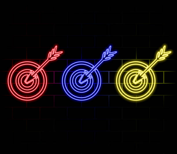istock A set of neon bright targets in different colors on a dark background. 2178771732