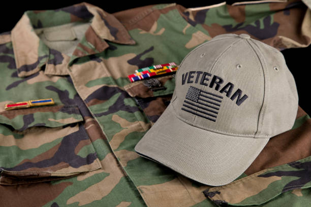 istock American veterans jacket and cap, black background 2178771743