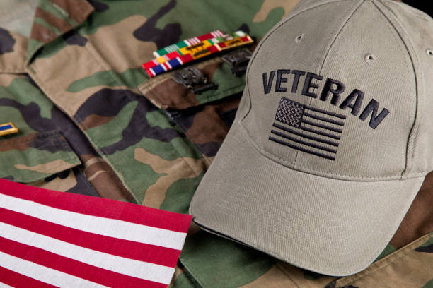 istock American veterans jacket and cap with American Flag 2178771745