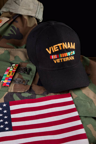 istock Vietnam veterans decorations, jacket, cap and American Flag 2178771800