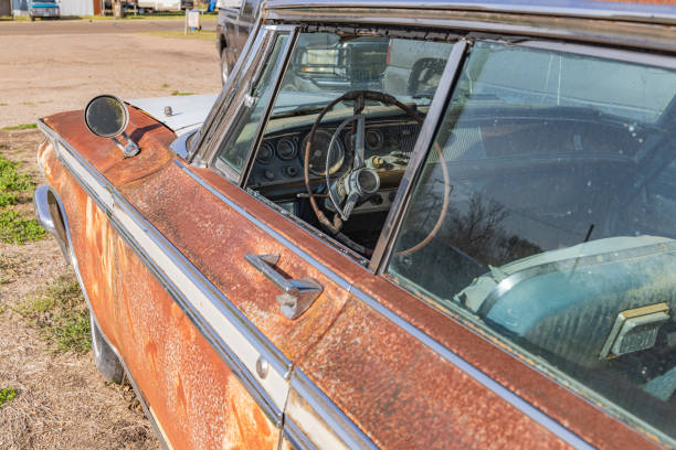 Yoakum, Texas, United States. March 17, 2022. An old rusted Chrysler car in a Texas junkyard.