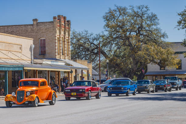 Goliad, Texas, United States. March 19, 2022. Classic cars in a small town parade.