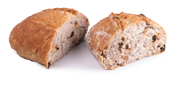 istock wholemeal artisan bread with grapes round cut in half baked fresh isolated 2178775603