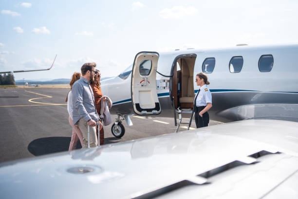istock Welcoming Interaction with Female Pilot at Private Jet 2178788489