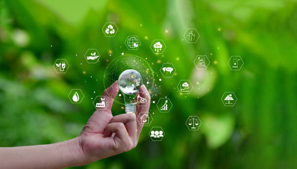 istock Hand holding Glass globe on green background with icons energy sources for renewable, sustainable development. Ecology concept. 2178797051