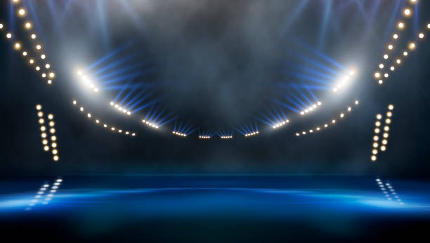 istock Bright stadium arena lights and smoke 2178797052