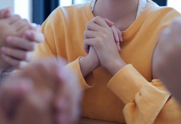 istock Group of asian people praying worship believe. Small group learning with prayer concept. 2178797063