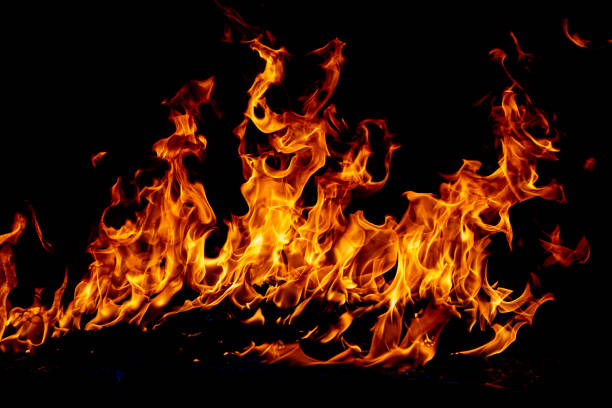 istock Texture of fire on a black background. Abstract fire flame background, large burning fire. 2178798092