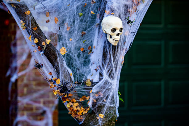 Halloween skull decorations. Halloween skull skeleton for decorated house. Scary skull Decorated at front yard of a American home. Trick or treat. Halloween skull background. Holiday of Halloween