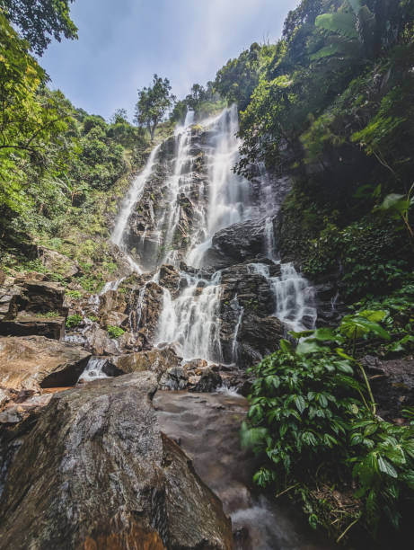 istock the atmosphere of the waterfall in the forest 2178800788