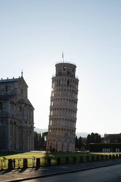 Pisa, Italy, June 15, 2023: Exterior view of the world famous Leaning tower of Pisa, a freestanding bell tower and one of three structures in the Cathedral Square of Pisa