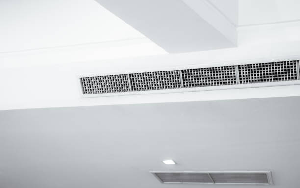 istock Air flow and ventilation system. Air Handling Units on ceiling walls for efficient cooling. Building ventilation. Air Handling Units and climate control systems. Ceiling-mounted ventilation units. 2178808281
