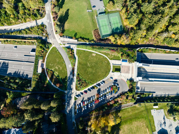 istock Trees and Bushes Cover a Lid over Freeway 2178808480
