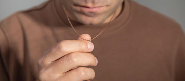 istock Caucasian man with a golden necklace. 2178811509