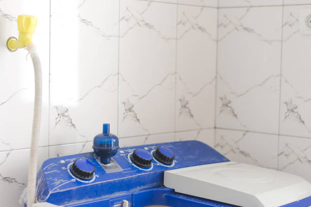 istock Washing machine button and water faucet in the house 2178813862