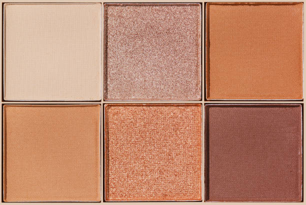 istock Neutral Eyeshadow Palette with Matte and Shimmer texture, natural colored shades on beige. Set of eyeshadow refills, Top view of four Swatches Eyeshadow makeup for cosmetic, makeup, beauty concept 2178815854