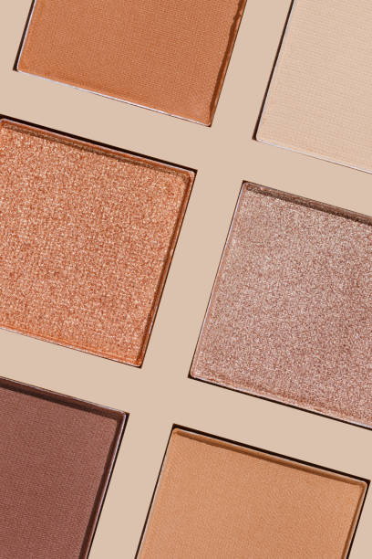 istock Swatches eyeshadow refills as minimal graphic pattern. Matte and glitter pans beige brown copper shade, detailed texture, sun light, minimal trend cosmetics background, beauty product, eye makeup 2178815857