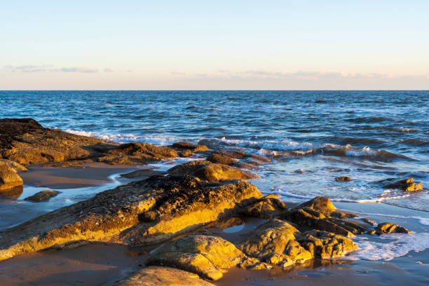 istock sunset by the sea 2178816430