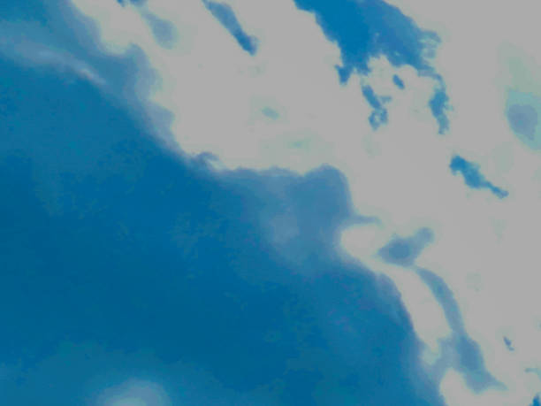 istock Beautiful blue sky dotted with white clouds illuminated by the sun 2178818997