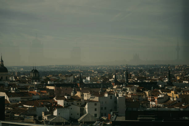 A breathtaking panoramic view of Madrid’s rooftops, showcasing the blend of terracotta tones and historic architecture. This vista captures the essence of Madrid’s charm, where every corner tells a story, from the old-world buildings to the expansive skyline that stretches far beyond the city limits.