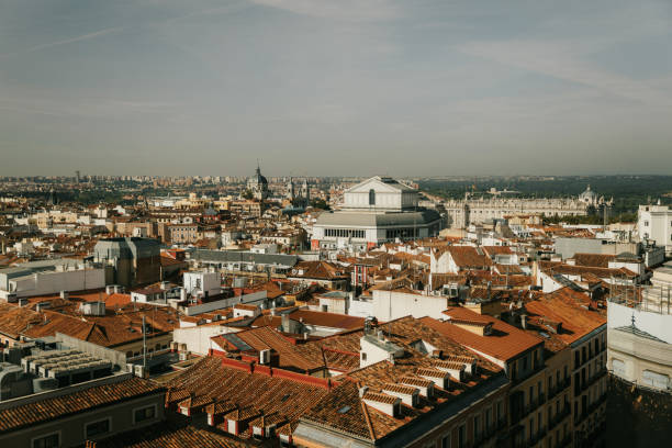 A breathtaking panoramic view of Madrid’s rooftops, showcasing the blend of terracotta tones and historic architecture. This vista captures the essence of Madrid’s charm, where every corner tells a story, from the old-world buildings to the expansive skyline that stretches far beyond the city limits.