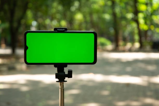 istock Smartphone with Green Screen in Public Area – Chroma Key Mobile Mockup 2178820904