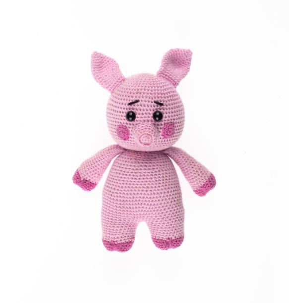 istock knitted toy pink pig isolated on white background 2178820999