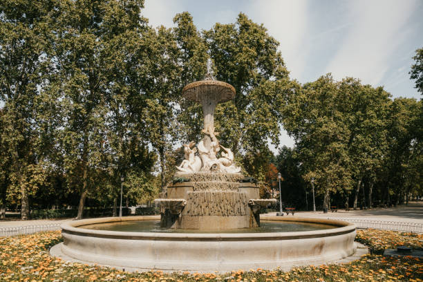 istock Ornate Fountain in Madrid Park Surrounded by Lush Greenery 2178821516