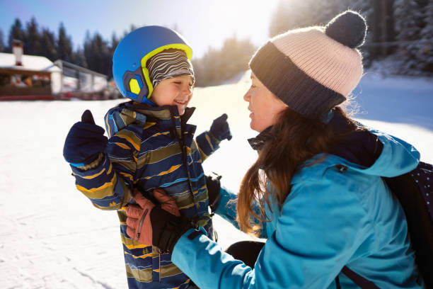 istock Mom and son on a ski vacation 2178824861