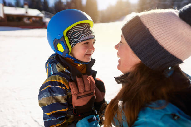 istock Mom and son on a ski vacation 2178824893