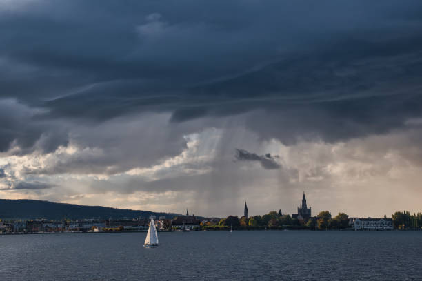 Single sailboat on the Lake Constance in stormy weather