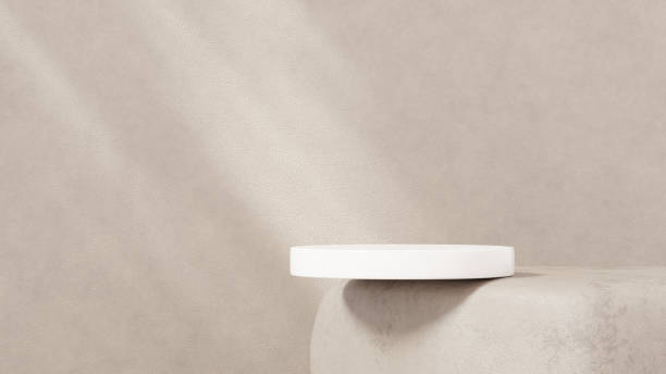 istock 3D background with beige tones and a podium set, featuring a play of light and shadow. An abstract geometric composition in a minimalist design. designed as a fashion stage for showcasing mockup scenes. 2178830234