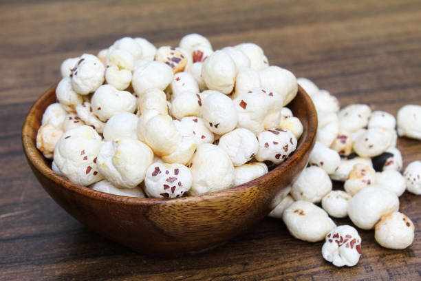 istock Fox nuts or makhaana in a wooden bowl side view 2178835078
