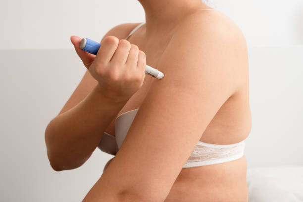 istock Woman injecting semaglutide in her arm. 2178836324