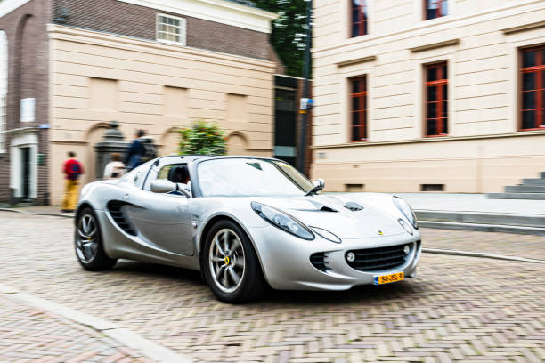 Lotus Elise 1111R Series 2 sports car driving on the street in Zwolle during a charity event.